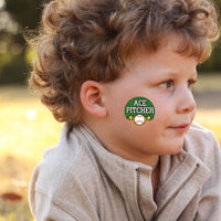 Thumbnail for boy outside with baseball themed temporary tattoo on his cheek