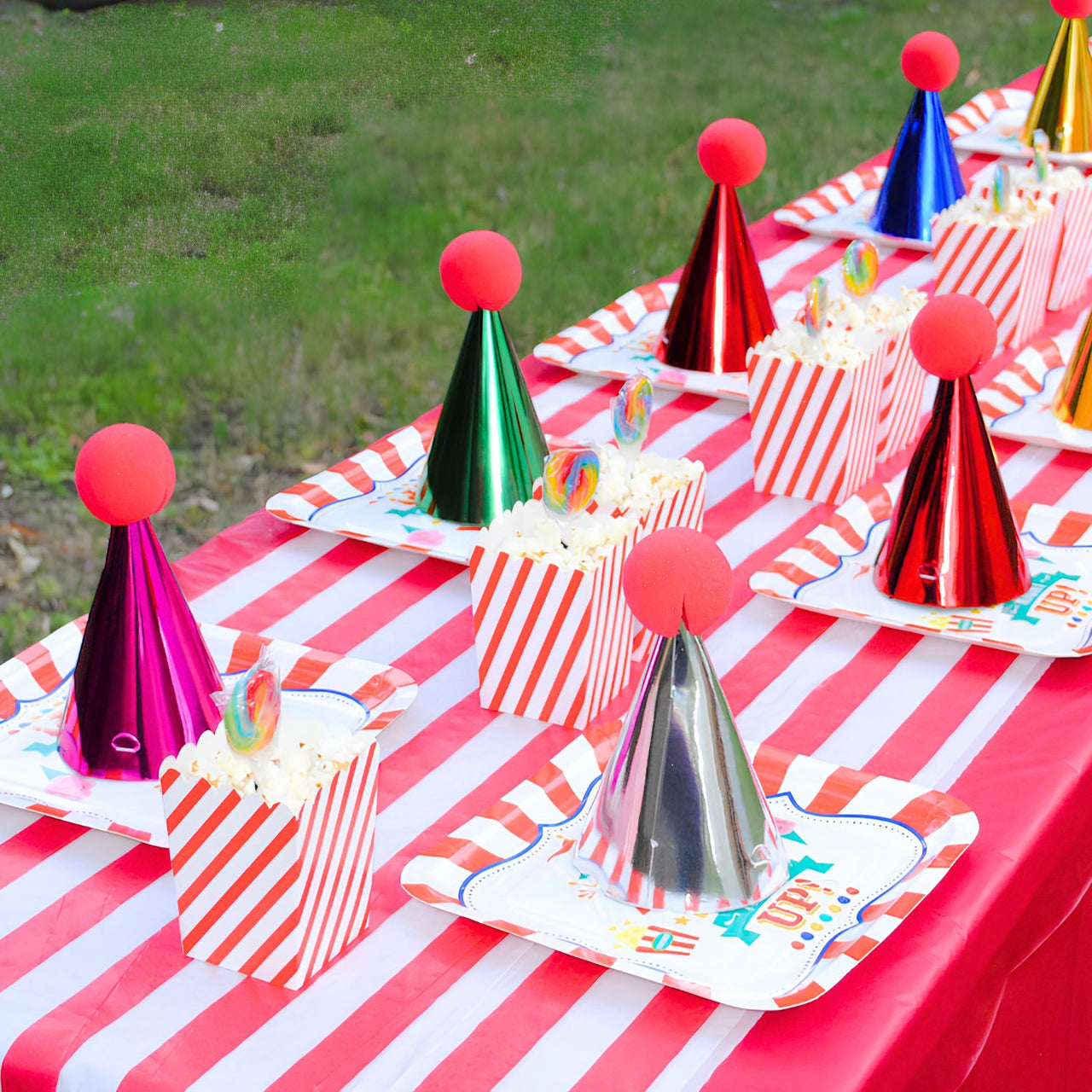 clown noses on party table hats