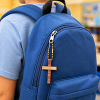 Thumbnail for cross keychain on a backpack