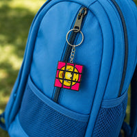Thumbnail for cube game keychains on a backpack