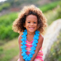 Thumbnail for cute girl with blue flower lei