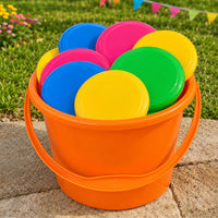 Thumbnail for colorful flying saucers in a orange bucket outside