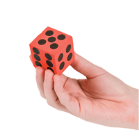 Thumbnail for hand holding foam dice