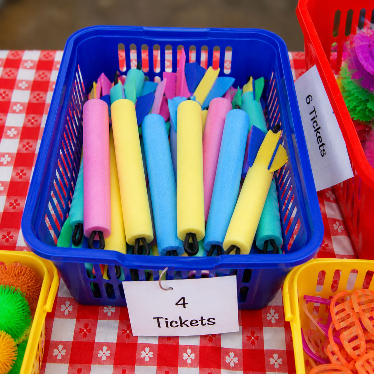 foam rockets at a school carnival prize booth