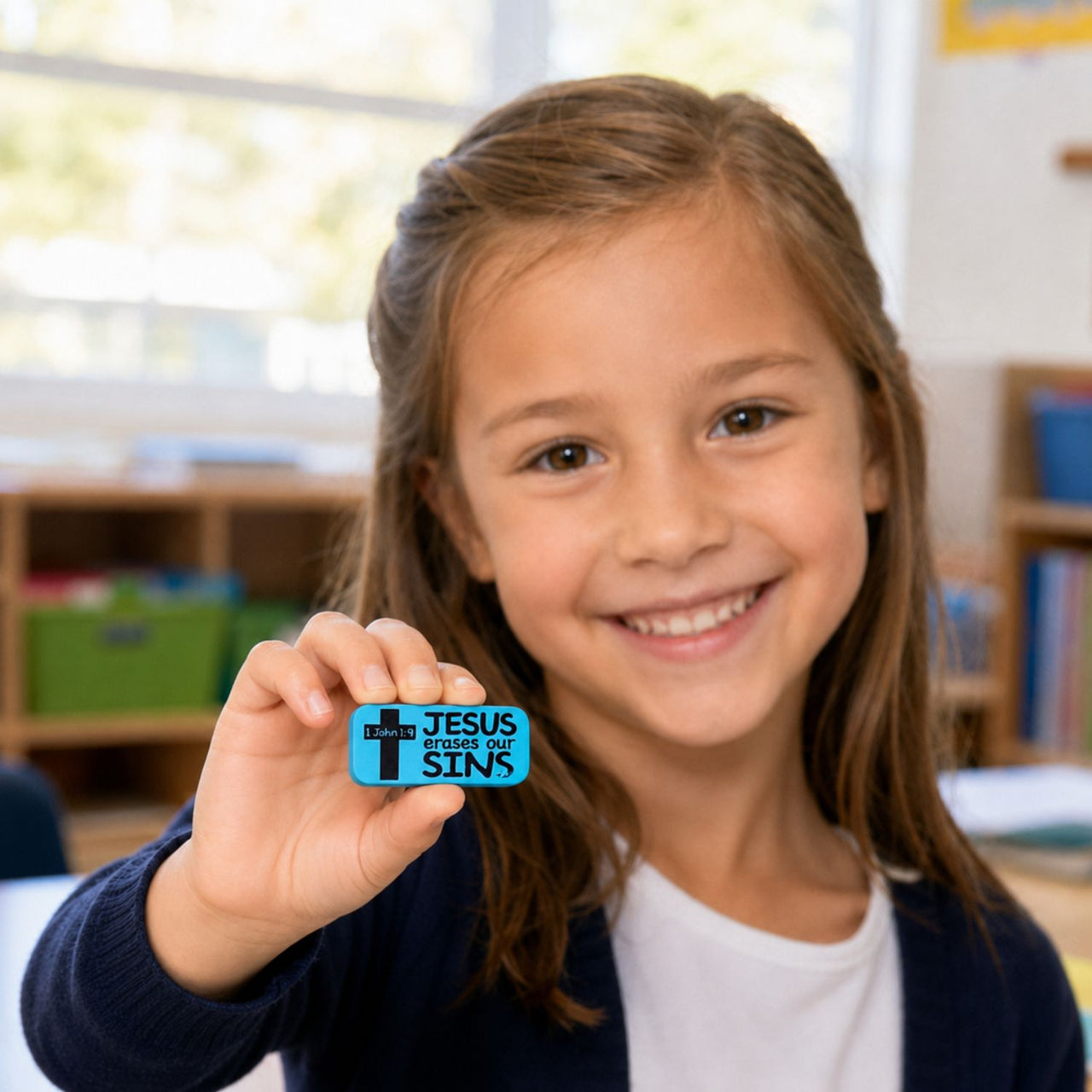 girl holding Jesus erases sin eraser