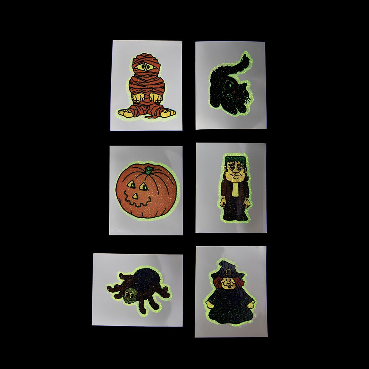 glowing  photo of assorted halloween kiddie tattoos