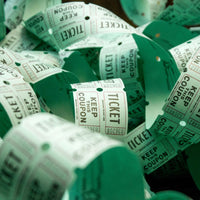 Thumbnail for green double roll tickets bulk on a table