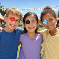 Thumbnail for kids outside smiling with assorted pirate patches on