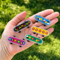 Thumbnail for mini 60's skateboards in a hand