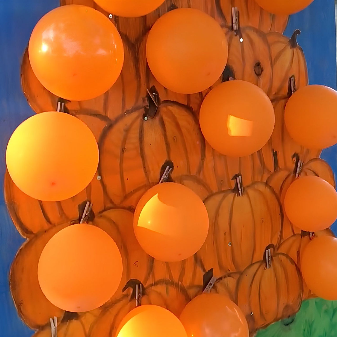 orange balloons used for fall festival game