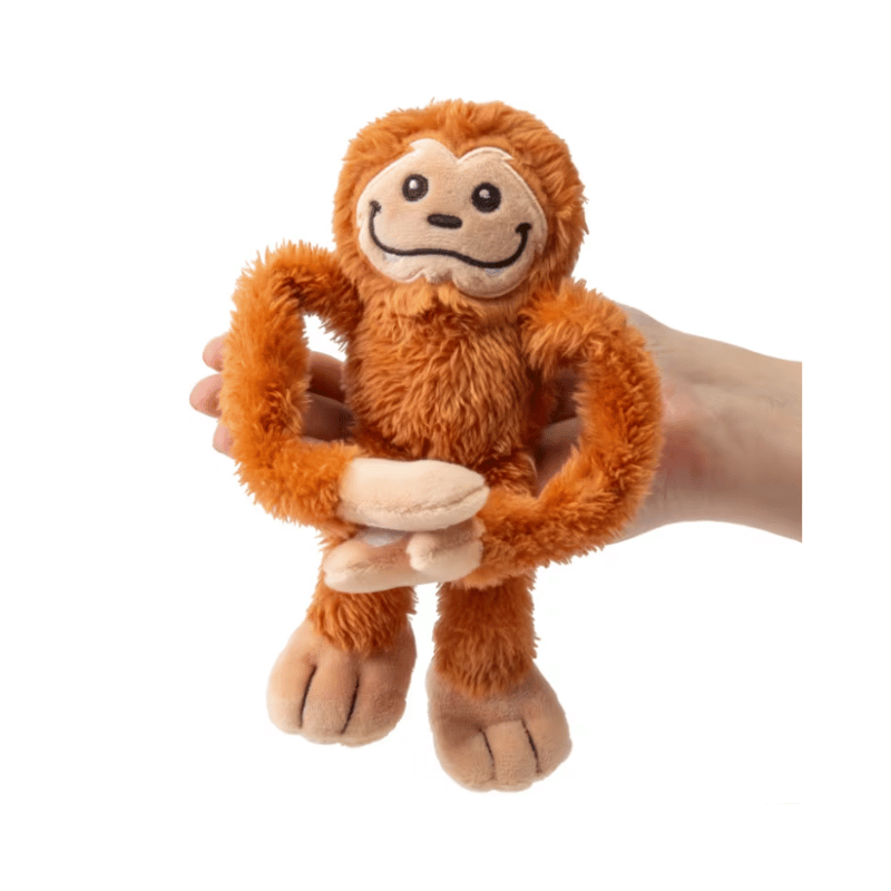 plush toy in a hand to show size