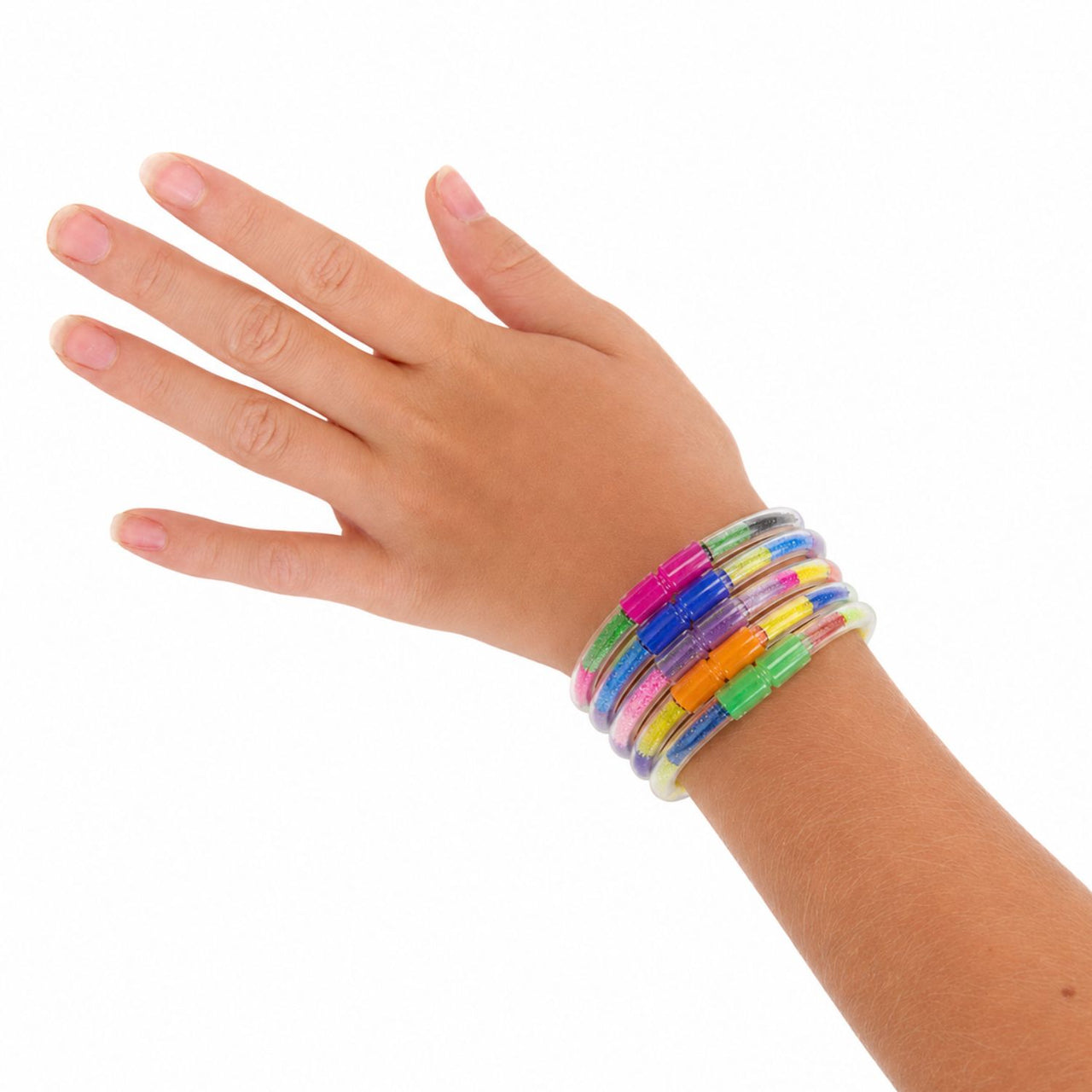 sand art bracelets stacked on a child's arm 