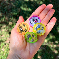 Thumbnail for spider spin tops small toy in a hand