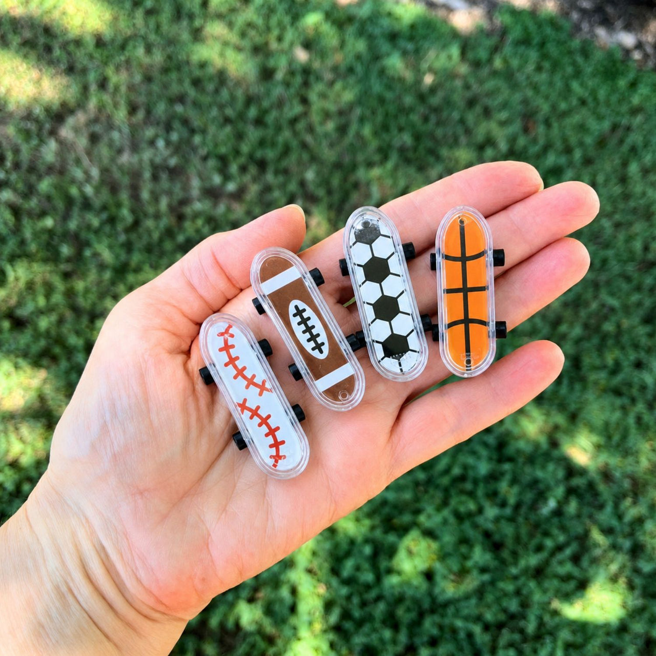 sports themed mini plastic skateboards