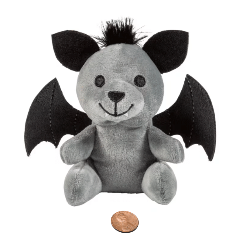 small stuffed bear with bat wings
