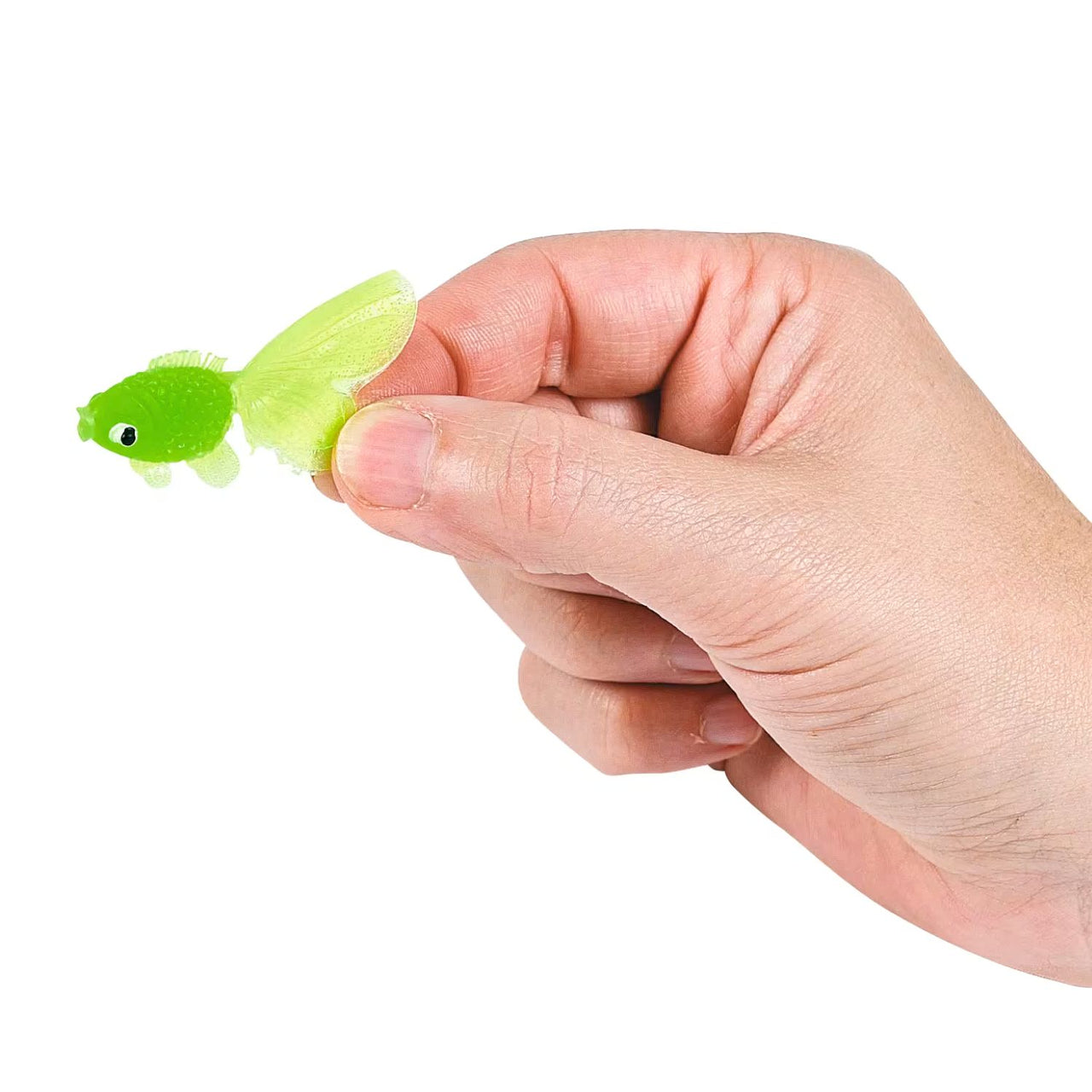 vinyl toy fish in hand for size