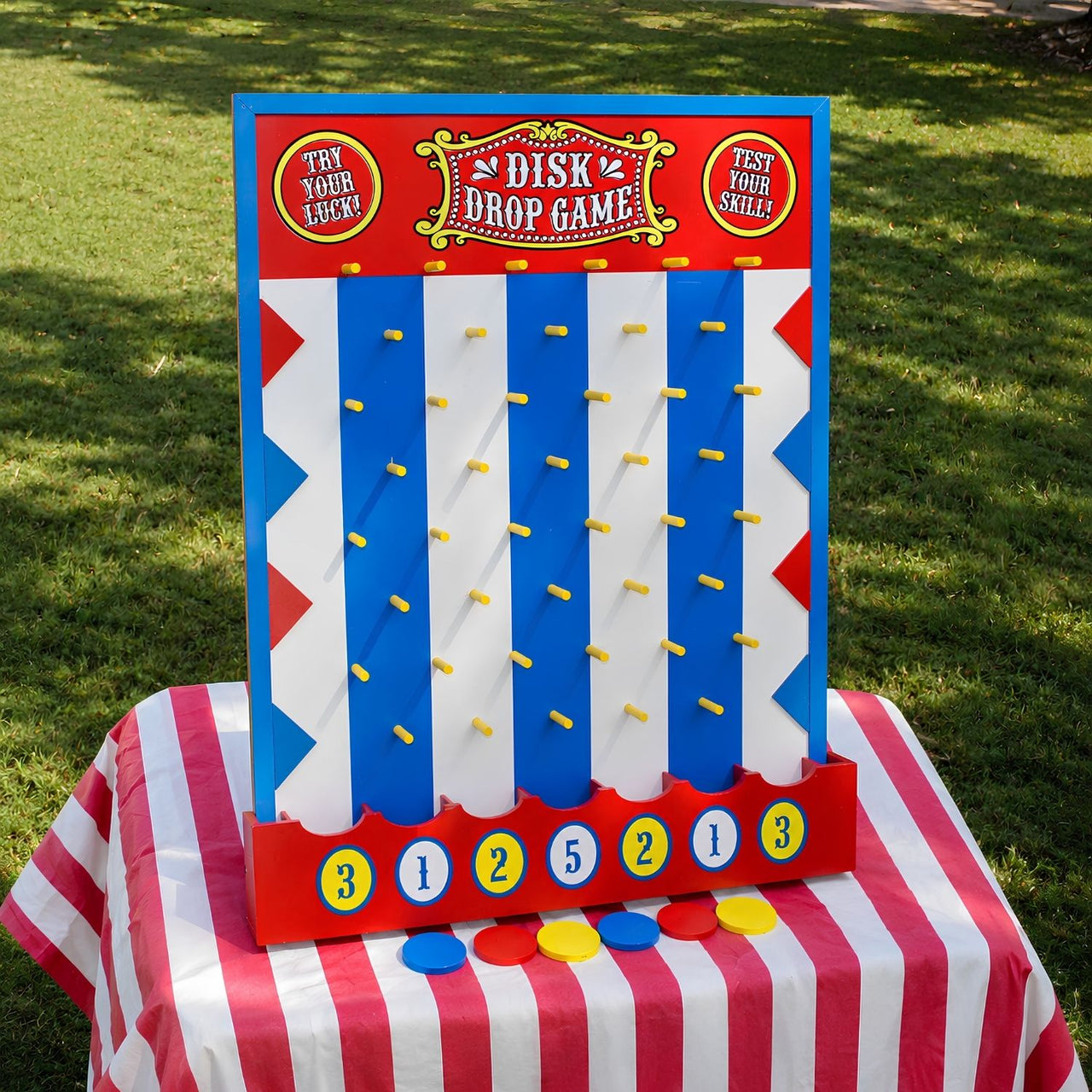 Wooden disc drop carnival game